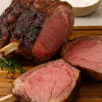 The best prime rib roast recipe features a perfectly golden-brown bone-in prime rib with a crispy crust and rich flavor for special occasions.