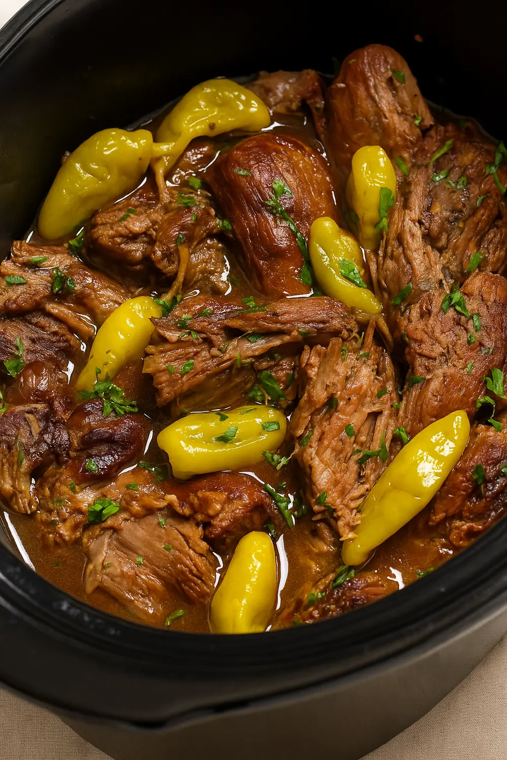 Best Crockpot Mississippi Pot Roast The best crockpot Mississippi roast beef with pepperoncini peppers and gravy.