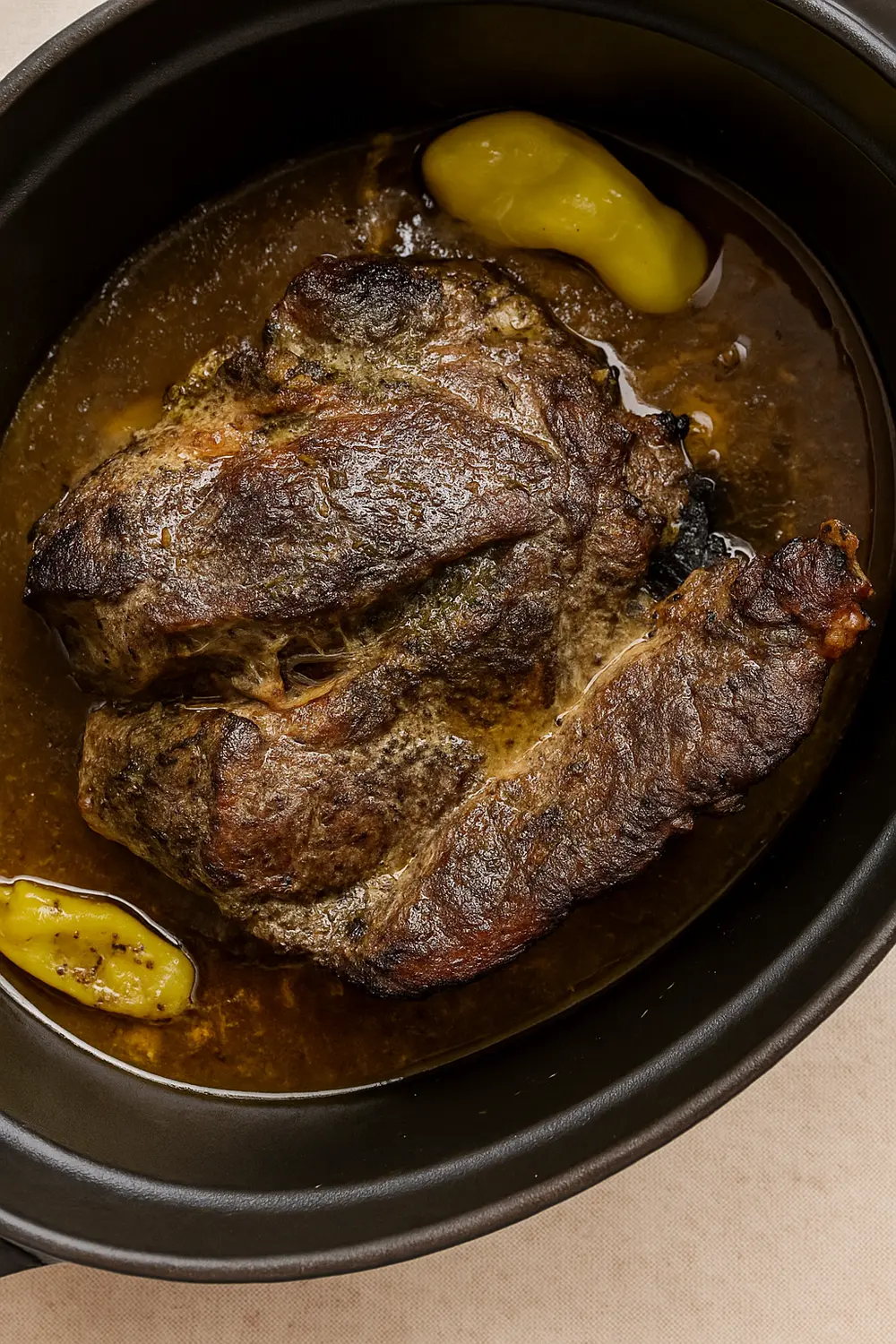 Best Crockpot Mississippi Pot Roast Slow cooker pot roast recipe featuring tender beef, pepperoncini, and rich buttery gravy, perfect for Thanksgiving or Christmas dinner.